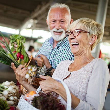 Senior couple making groceries